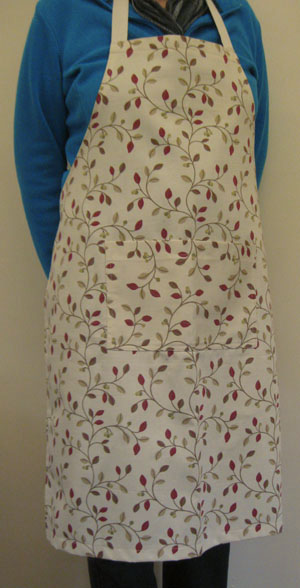 A photo of an apron on a model